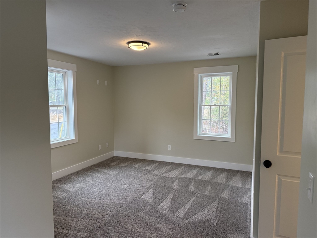 480 Wareham Street, Unit 2 Middleboro, MA 02346 - Photo 16 of 19 an empty room with windows