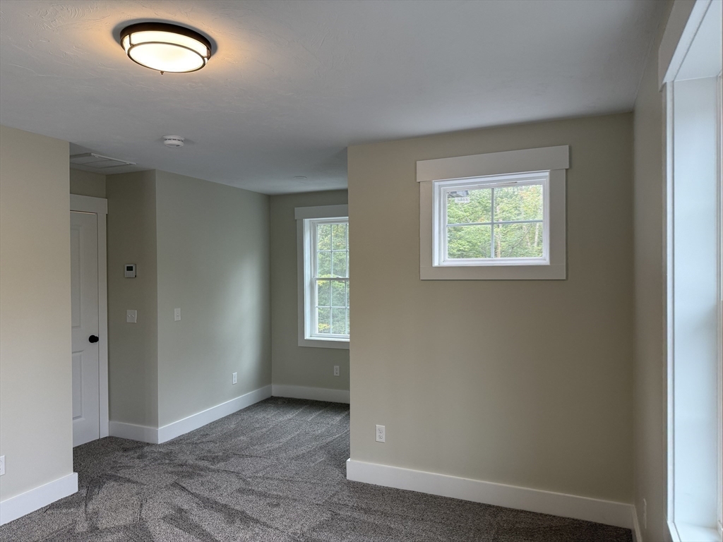 480 Wareham Street, Unit 2 Middleboro, MA 02346 - Photo 17 of 19 an empty room with windows