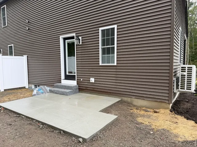 a front view of a house with garage