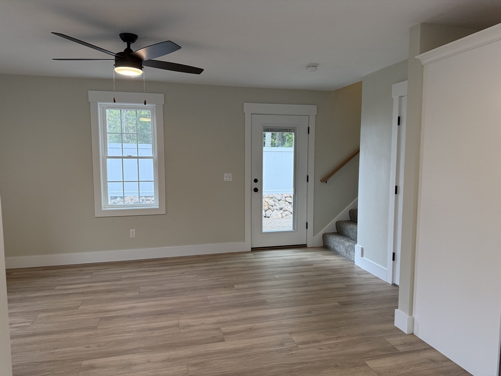 480 Wareham Street, Unit 2 Middleboro, MA 02346 - Photo 6 of 19 wooden floor in an empty room with a window