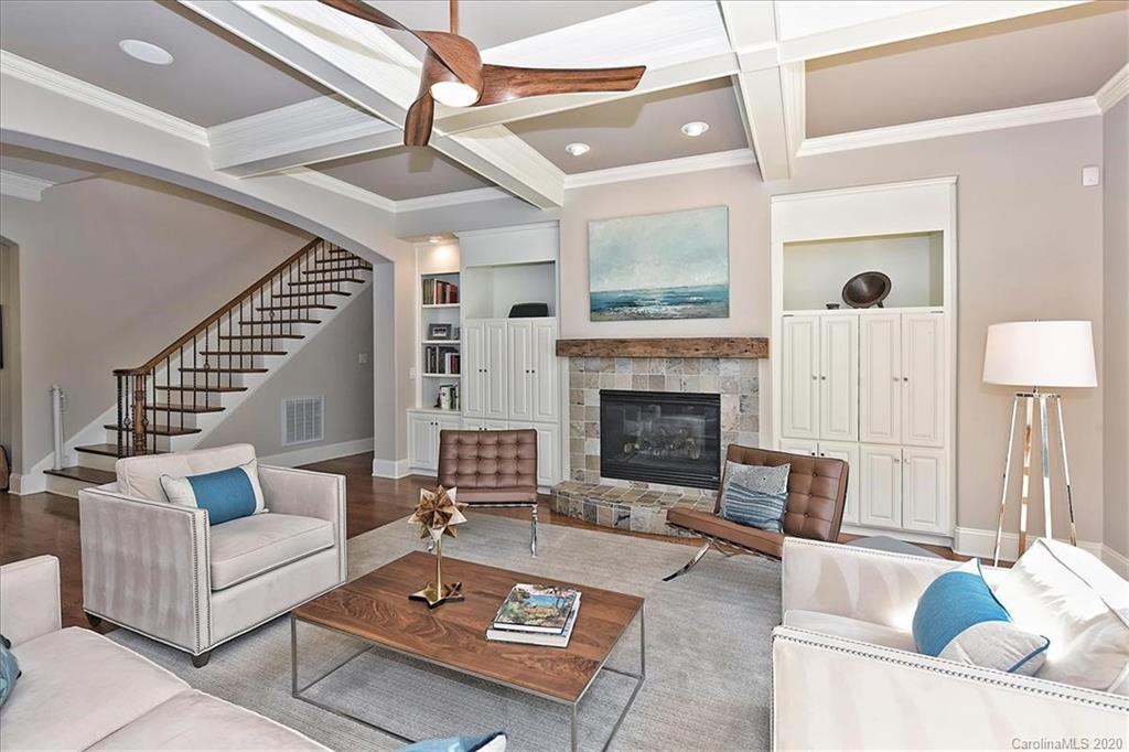 944 Bridlepath Lane Charlotte, NC 28211 - Photo 12 of 48 a living room with furniture and a fireplace