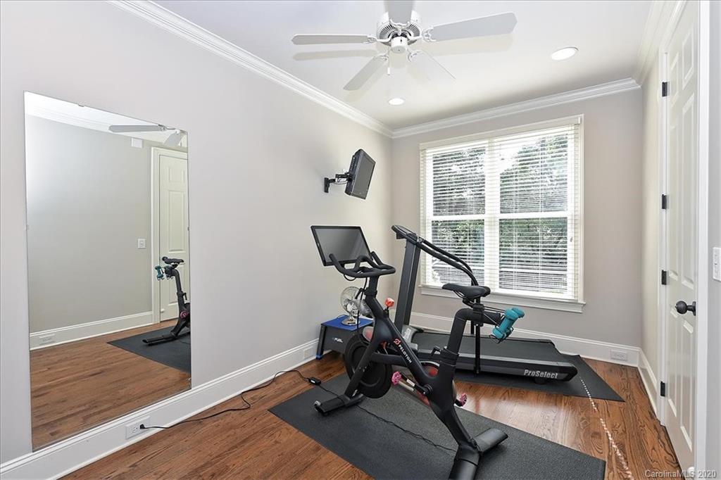 944 Bridlepath Lane Charlotte, NC 28211 - Photo 22 of 48 a view of a room with gym equipment
