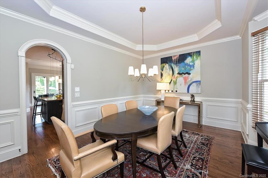 944 Bridlepath Lane Charlotte, NC 28211 - Photo 4 of 48 a view of a dining room with furniture window and wooden floor