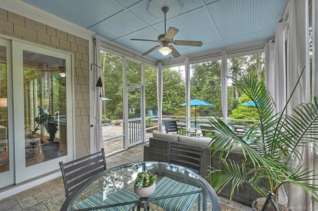 944 Bridlepath Lane Charlotte, NC 28211 - Photo 40 of 48 a living room with furniture and a large window