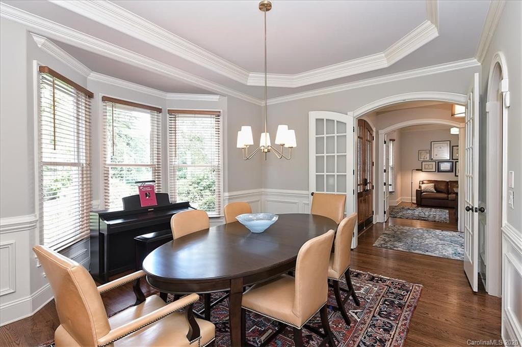 944 Bridlepath Lane Charlotte, NC 28211 - Photo 5 of 48 a view of a dining room with furniture window and wooden floor