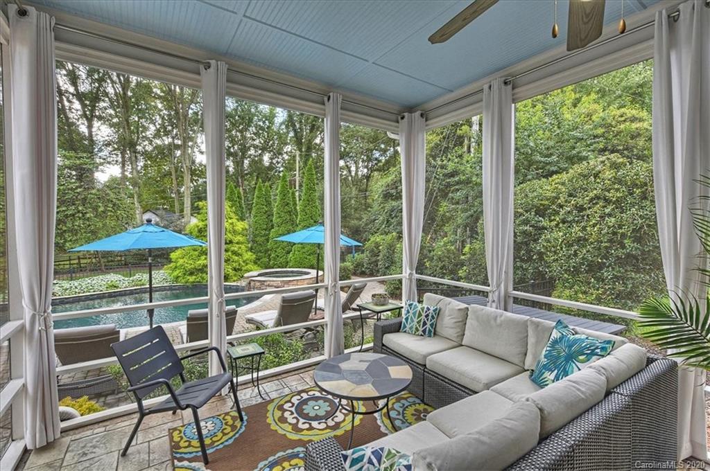 944 Bridlepath Lane Charlotte, NC 28211 - Photo 41 of 48 a living room with furniture and a window