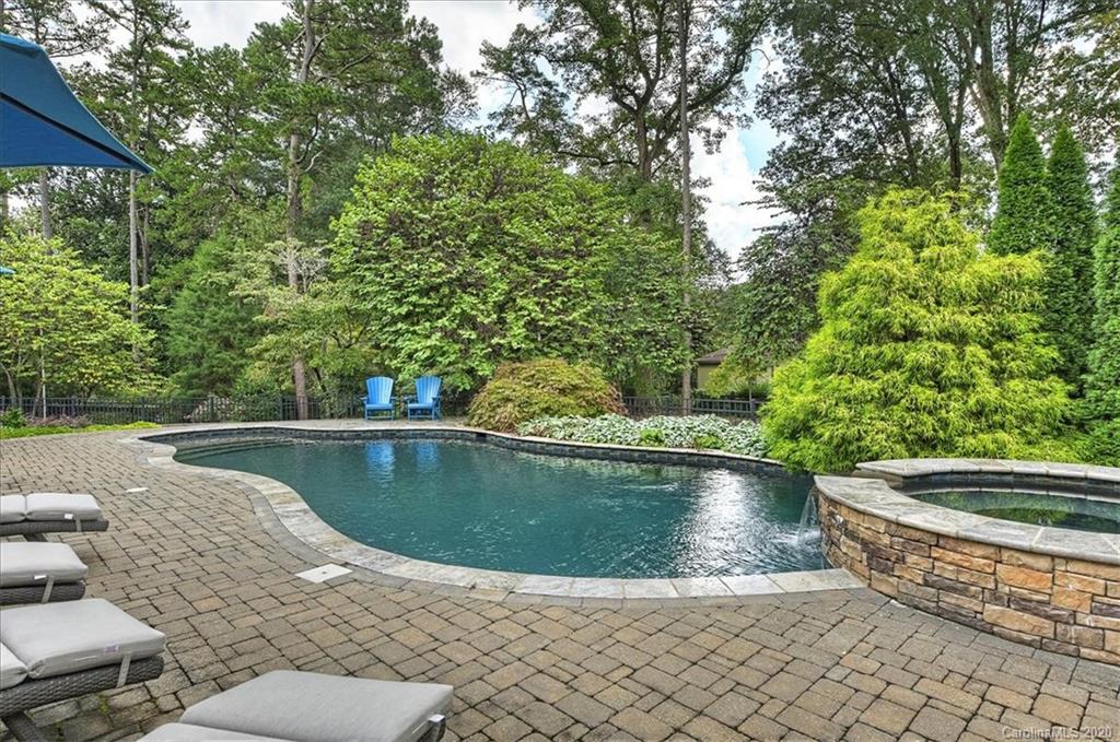 944 Bridlepath Lane Charlotte, NC 28211 - Photo 45 of 48 a view of a swimming pool with a patio