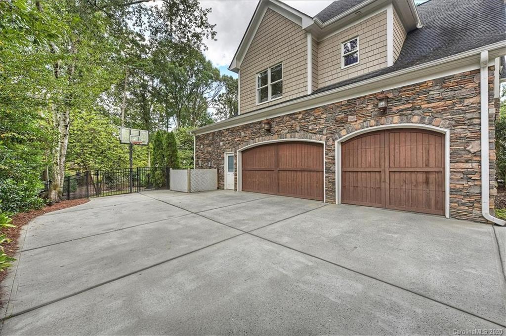 944 Bridlepath Lane Charlotte, NC 28211 - Photo 46 of 48 a view of a house with a garage