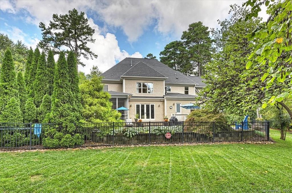 944 Bridlepath Lane Charlotte, NC 28211 - Photo 47 of 48 a front view of a house with a yard