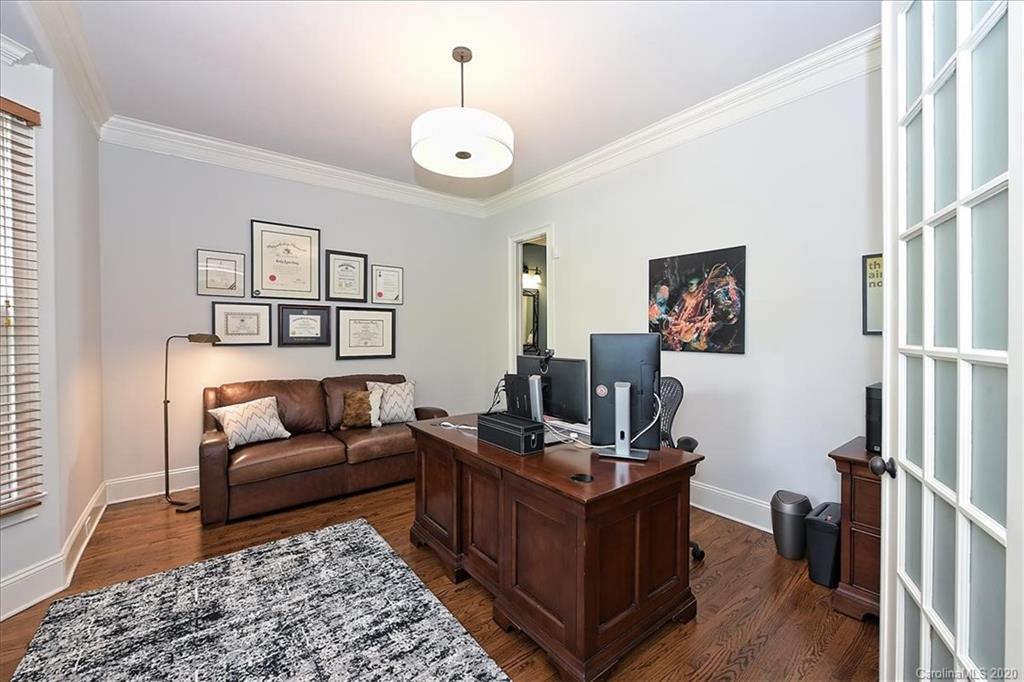 944 Bridlepath Lane Charlotte, NC 28211 - Photo 6 of 48 a view of a workspace with furniture and a window