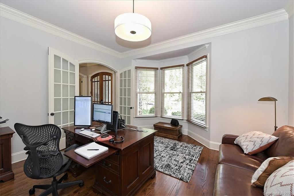 944 Bridlepath Lane Charlotte, NC 28211 - Photo 7 of 48 a living room with furniture and a large window
