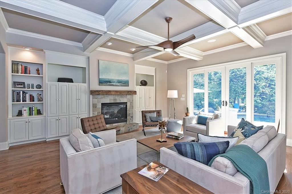 944 Bridlepath Lane Charlotte, NC 28211 - Photo 9 of 48 a living room with furniture and a fireplace