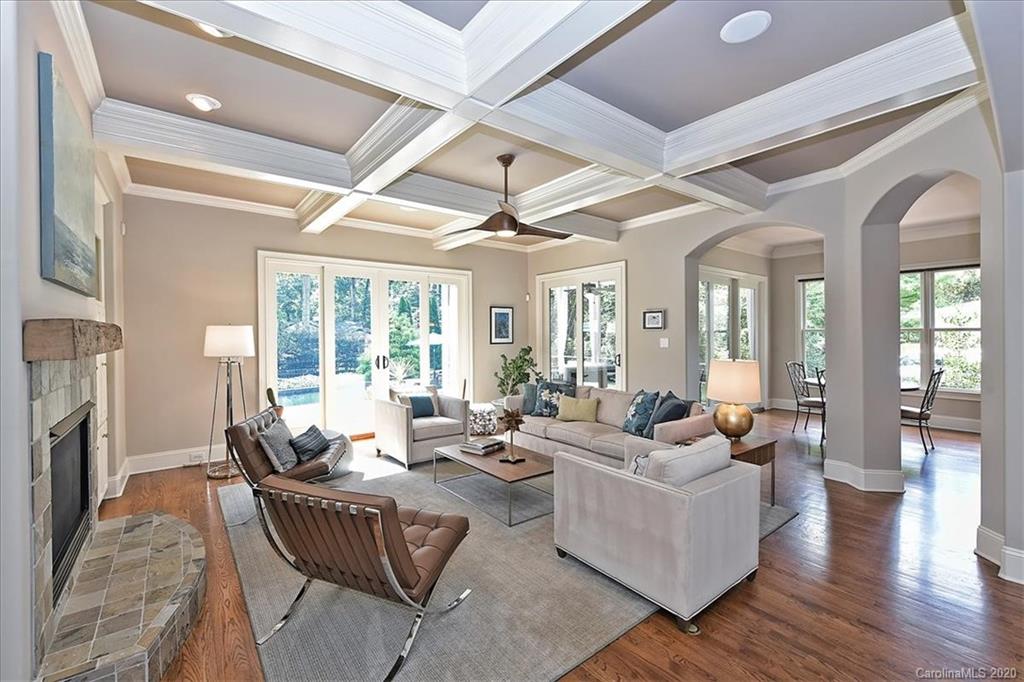 944 Bridlepath Lane Charlotte, NC 28211 - Photo 10 of 48 a living room with furniture and a fireplace