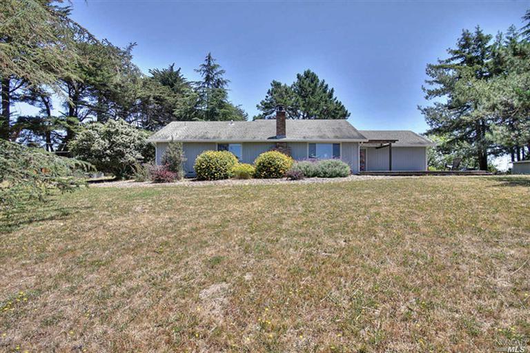 3043 Burnside Road Sebastopol, CA 95472 - Photo 1 of 1 a view of a house with a yard and garage