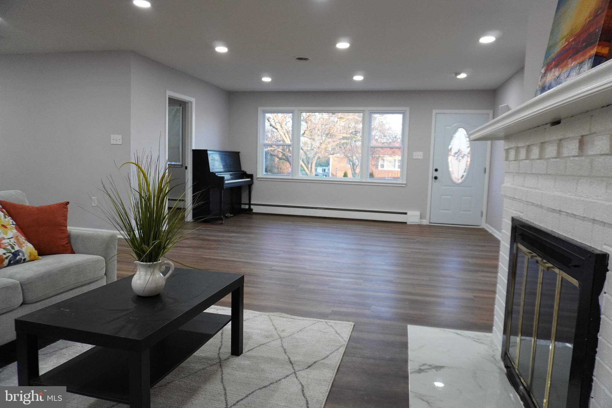 6618 Napoli Road Temple Hills, MD 20748 - Photo 27 of 49 Living room, view to entry
