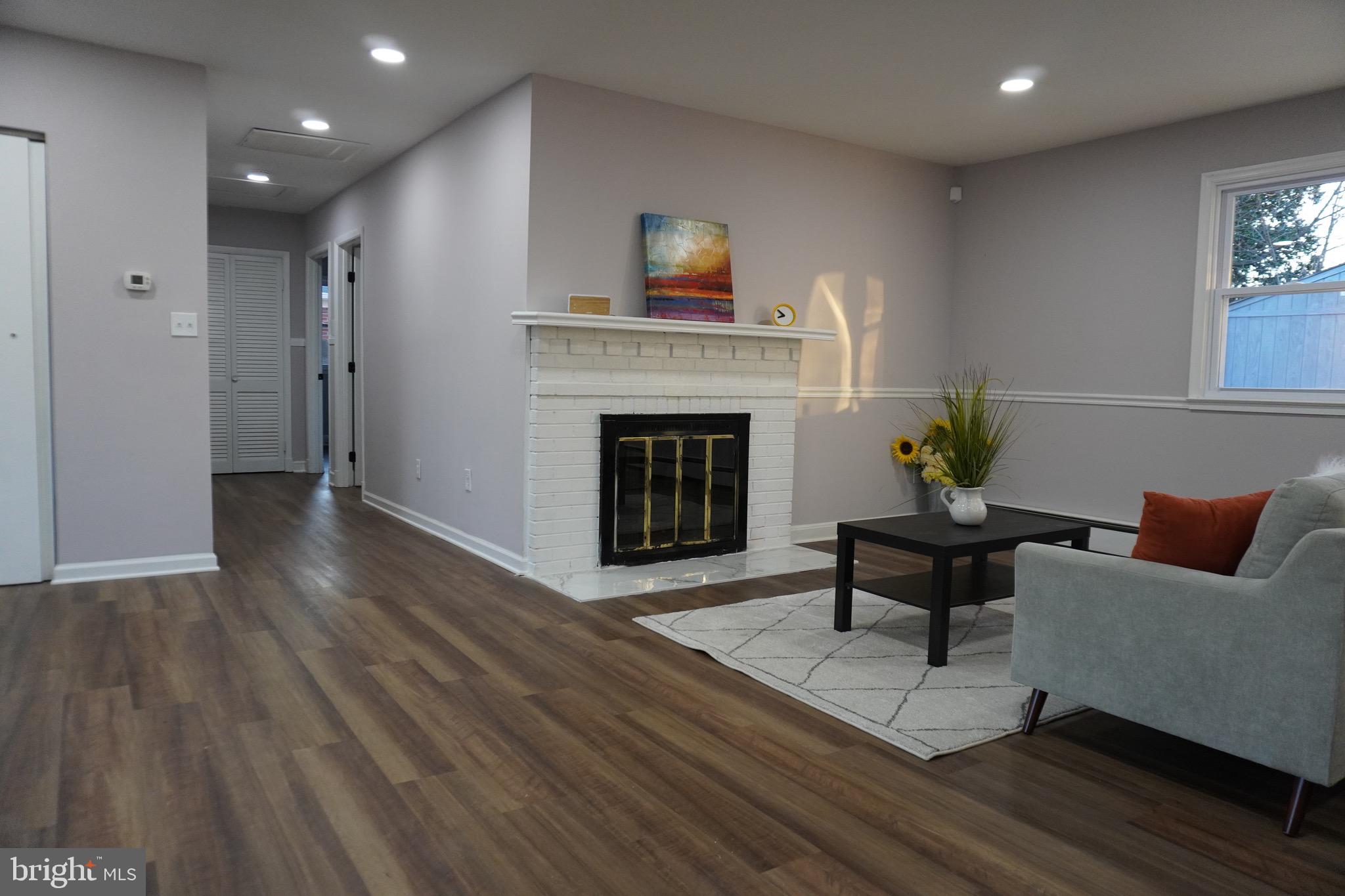 6618 Napoli Road Temple Hills, MD 20748 - Photo 6 of 49 Living room, wood burning fire place