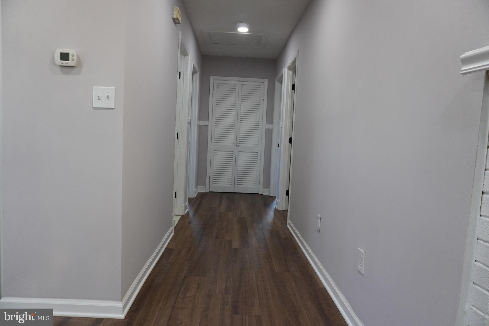 6618 Napoli Road Temple Hills, MD 20748 - Photo 7 of 49 Hall way to bedrooms, with big closet at the end