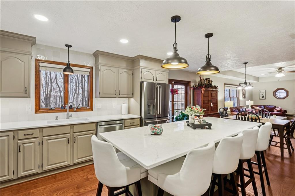 191 Castile Ridge Road Marianna, PA 15345 - Photo 12 of 50 a large kitchen with a table and chairs
