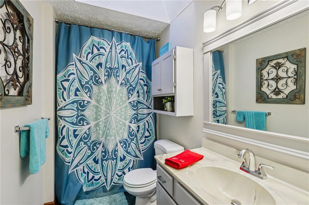 191 Castile Ridge Road Marianna, PA 15345 - Photo 24 of 50 a bathroom with a sink toilet and shower