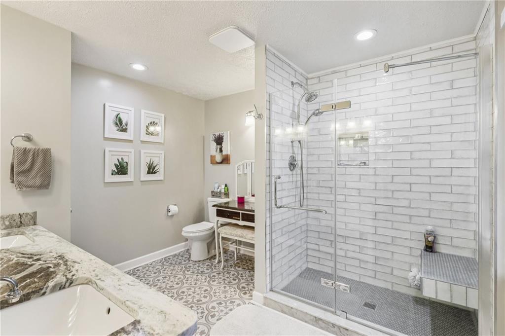 191 Castile Ridge Road Marianna, PA 15345 - Photo 33 of 50 a bathroom with a toilet sink and shower