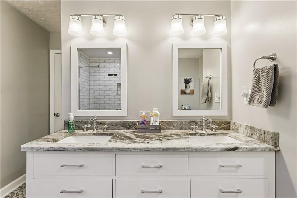 191 Castile Ridge Road Marianna, PA 15345 - Photo 35 of 50 a bathroom with a granite countertop sink and a mirror
