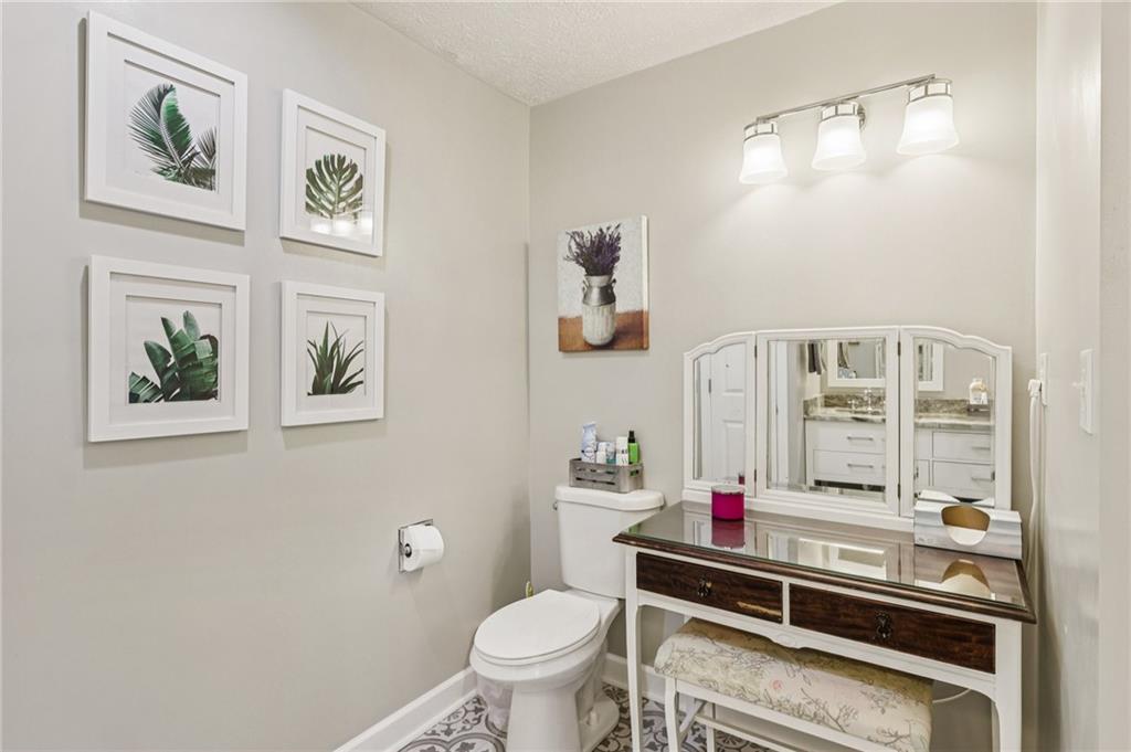 191 Castile Ridge Road Marianna, PA 15345 - Photo 36 of 50 a bathroom with a toilet sink and mirror