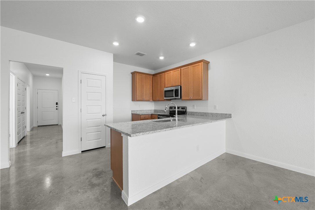 2905 Quail Rdg Lane Temple, TX 76501 - Photo 5 of 16 Please Note: These interior photos are not of the actual home but are of a completed one with a similar floor plan. Finishes, feeatures, and layouts may vary.