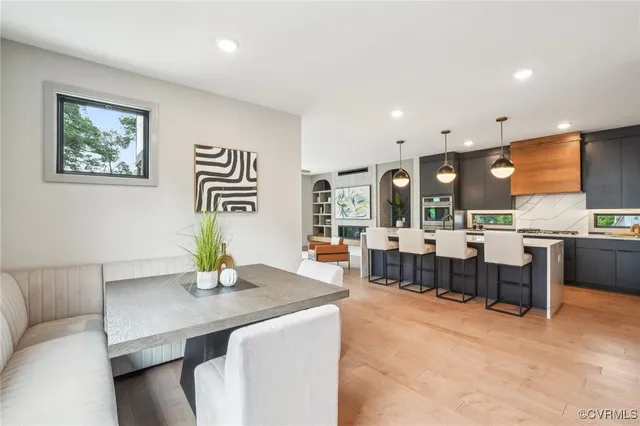 a living room with granite countertop furniture and window