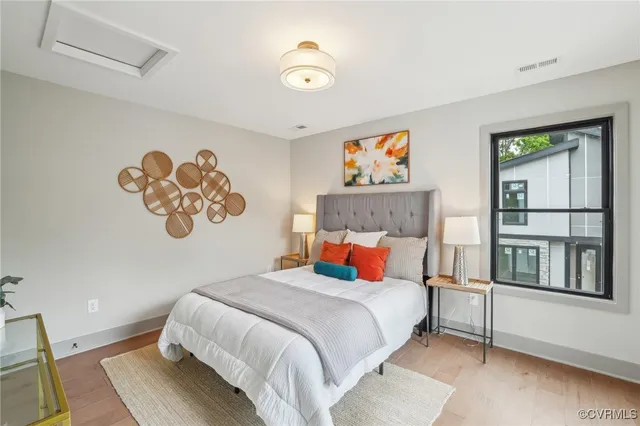 a bathroom with a bathtub and window