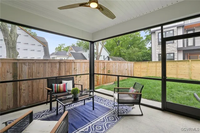 a storage room with an empty space and glass door