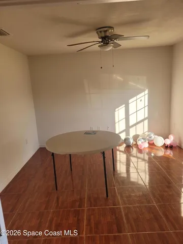 a bathroom with a sink mirror and vanity