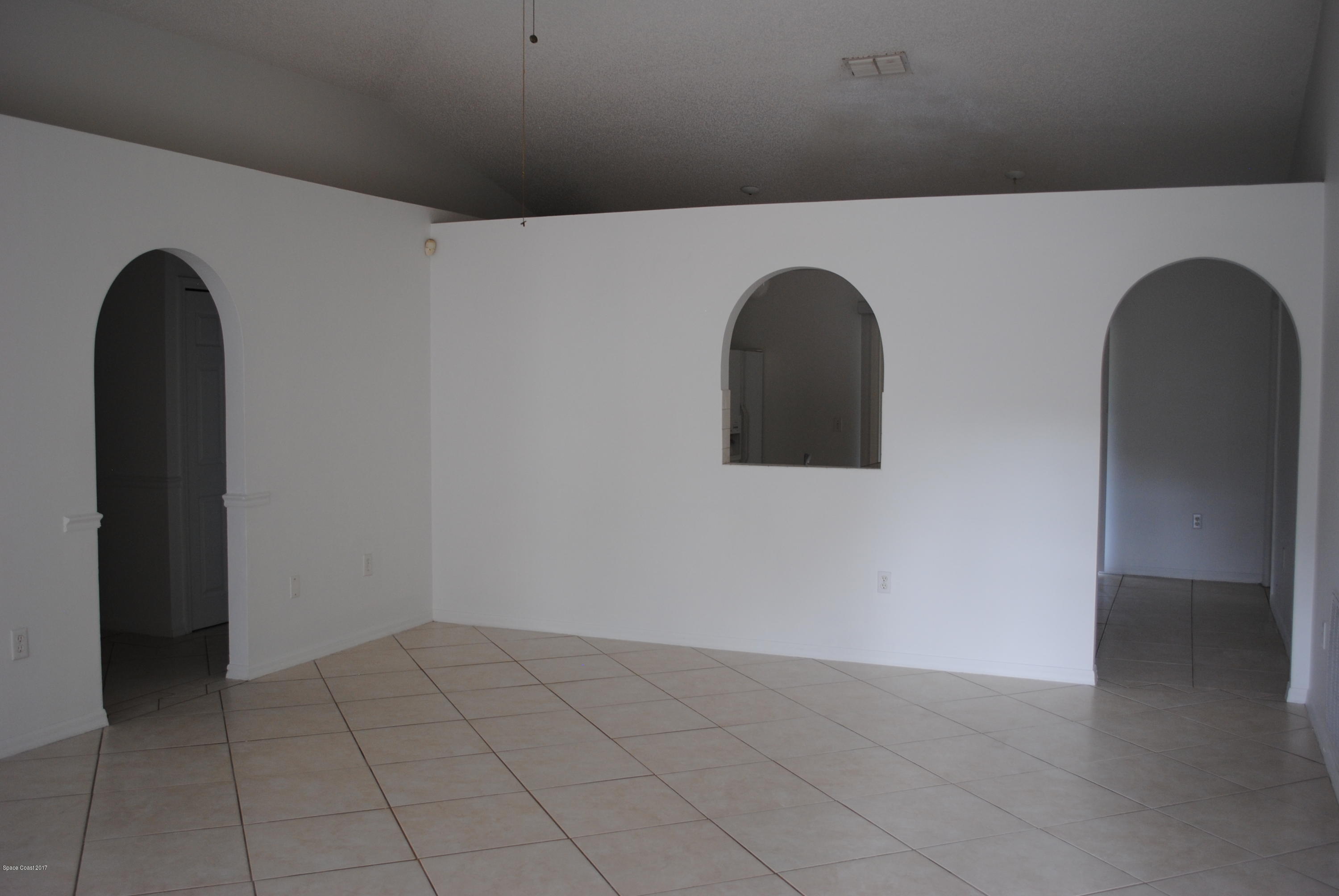 161 Tucson Road Southwest Palm Bay, FL 32908 - Photo 2 of 31 a view of a closet