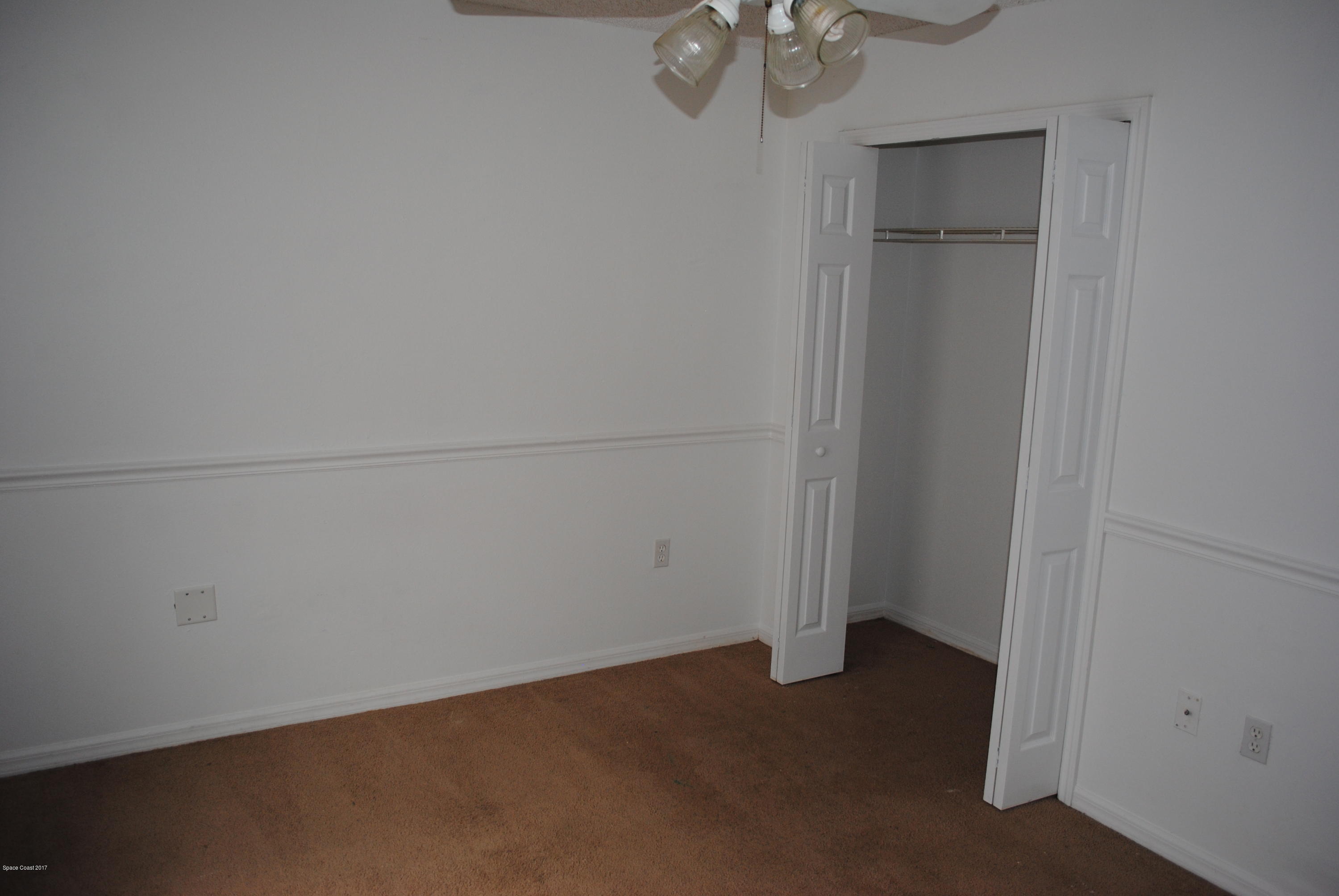 161 Tucson Road Southwest Palm Bay, FL 32908 - Photo 16 of 31 an empty room with a empty space