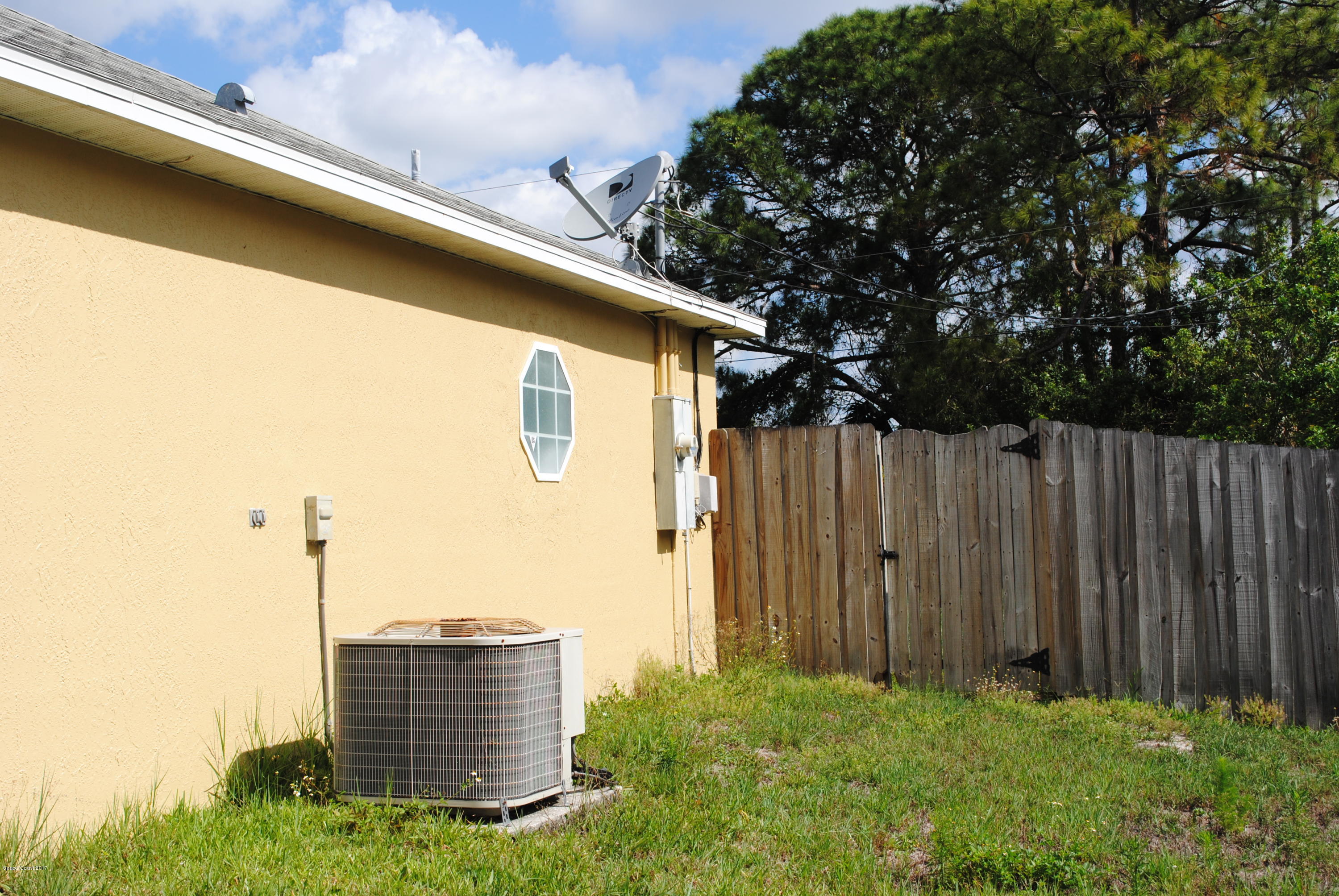 161 Tucson Road Southwest Palm Bay, FL 32908 - Photo 24 of 31 a view of outdoor space with seating area