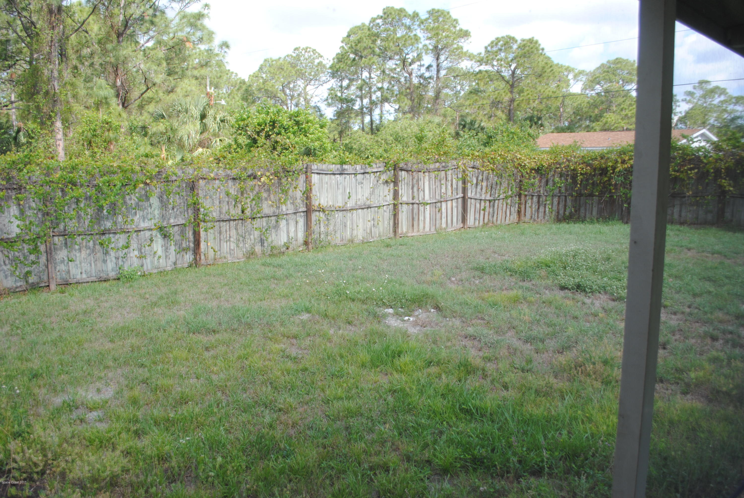 161 Tucson Road Southwest Palm Bay, FL 32908 - Photo 25 of 31 a view of outdoor space and yard