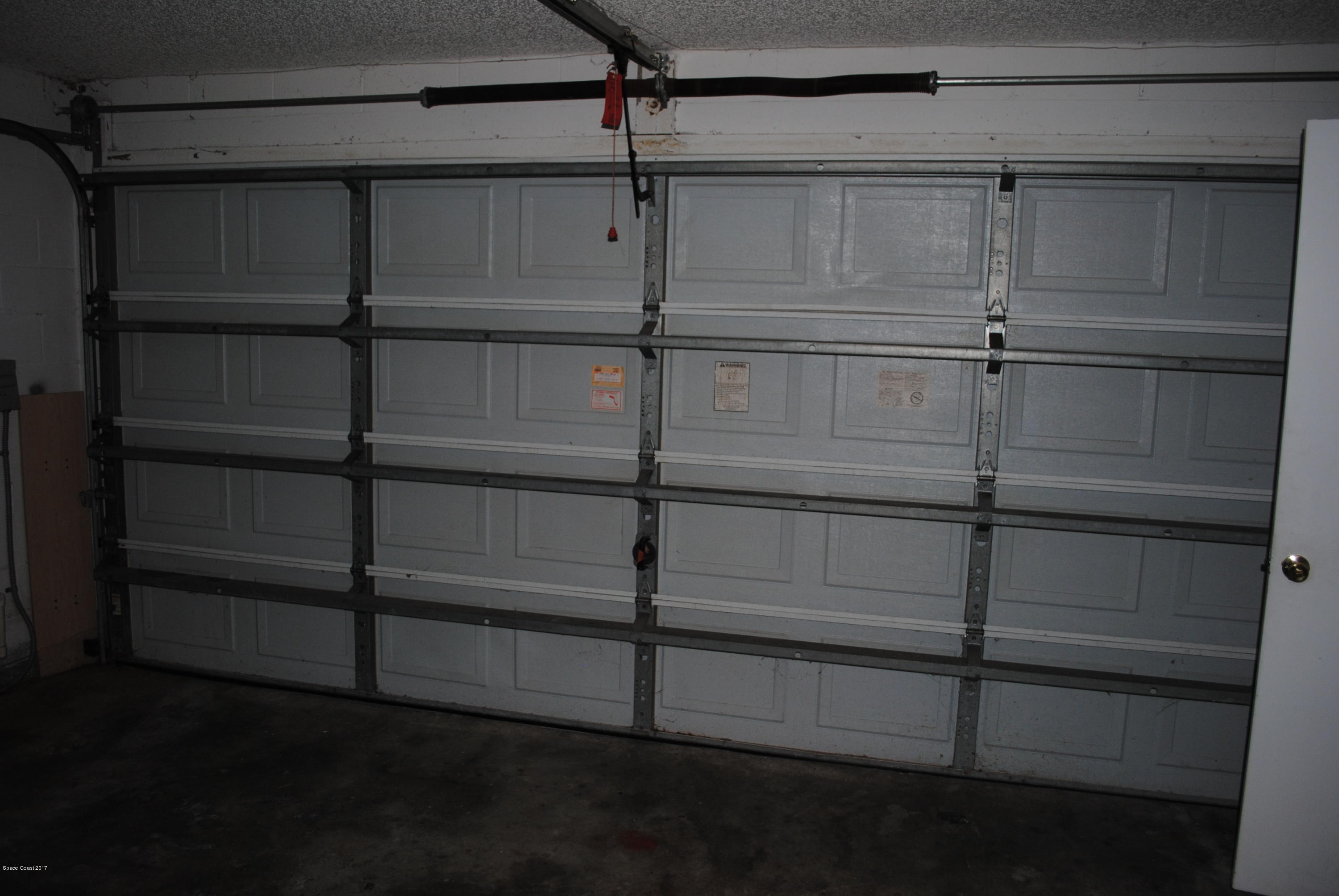 161 Tucson Road Southwest Palm Bay, FL 32908 - Photo 30 of 31 a view of a room with rack on the wall