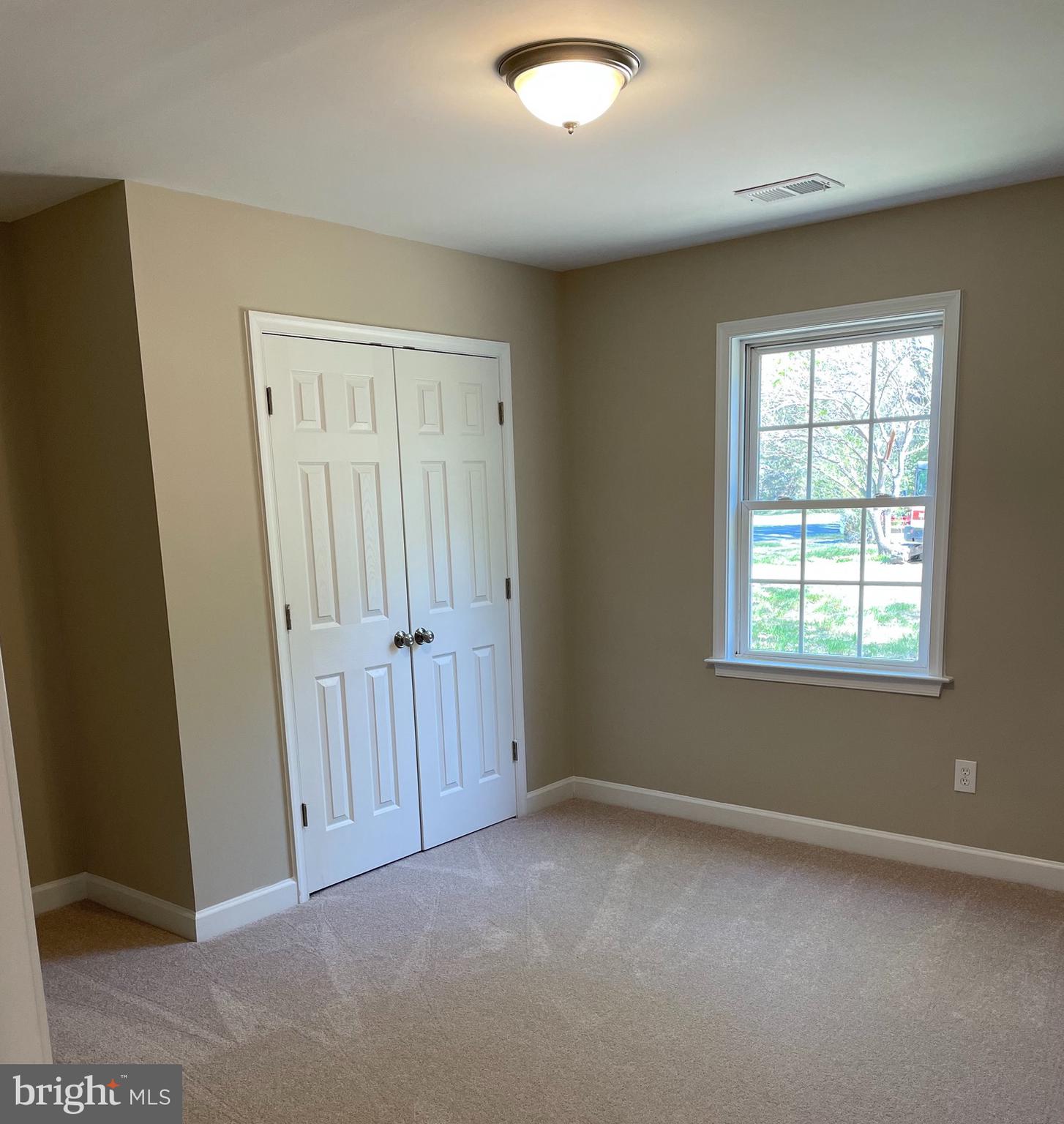 5831 Ridge Road Spotsylvania, VA 22551 - Photo 20 of 32 Bedroom THREEwith large closet and overhead light.