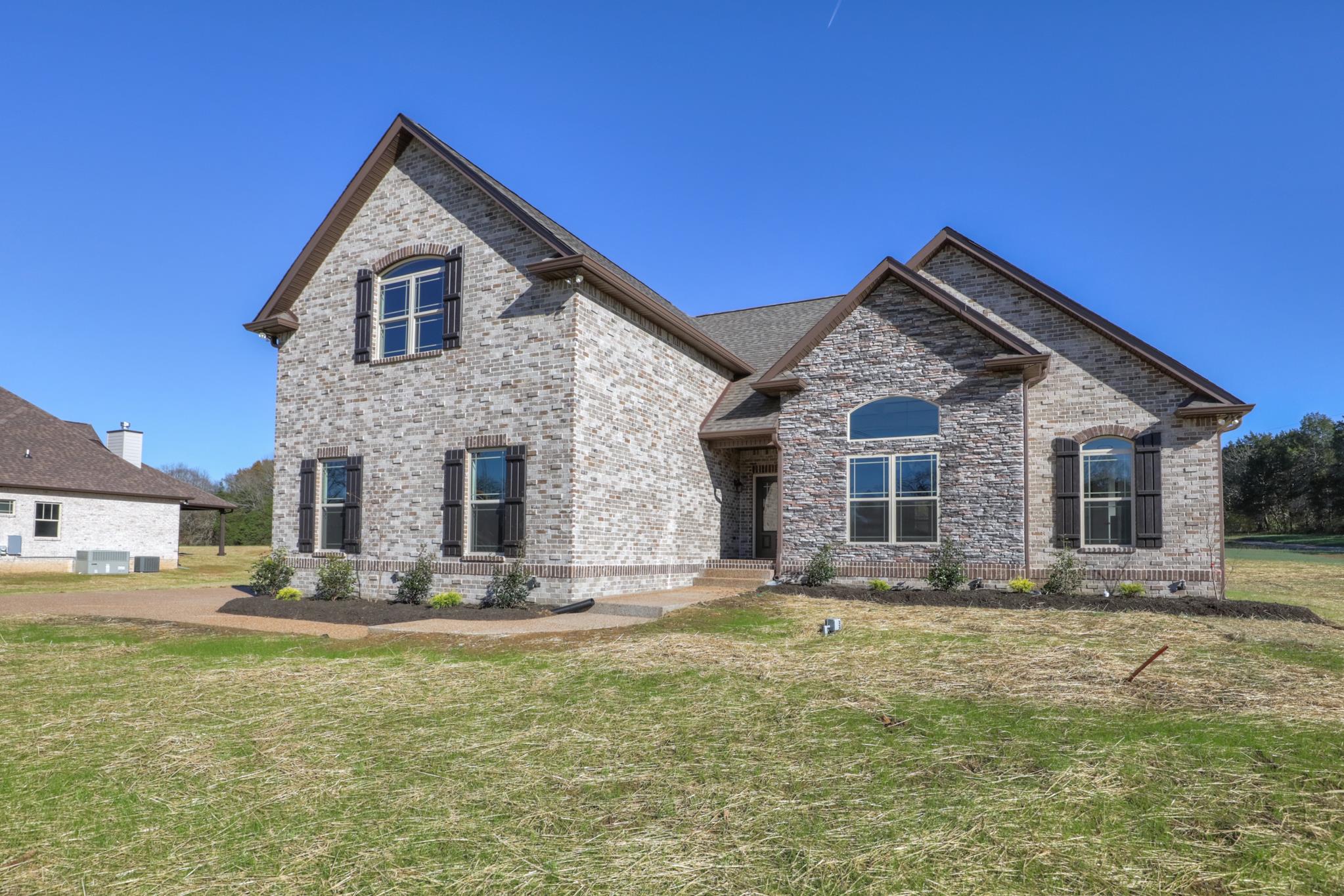 2211 Cairo Bend Road Lebanon, TN 37087 - Photo 2 of 29 a front view of a house with a yard