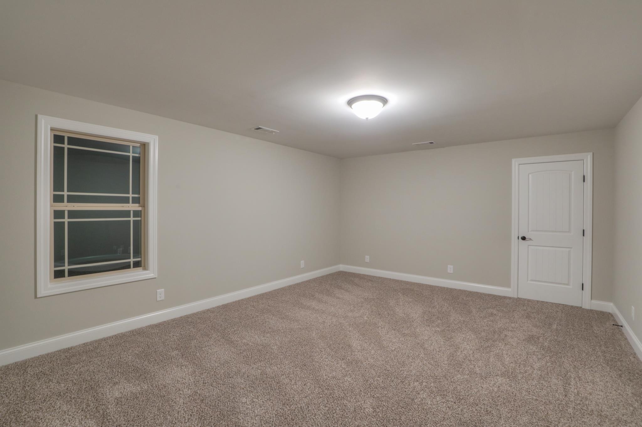 2211 Cairo Bend Road Lebanon, TN 37087 - Photo 24 of 29 an empty room with a window