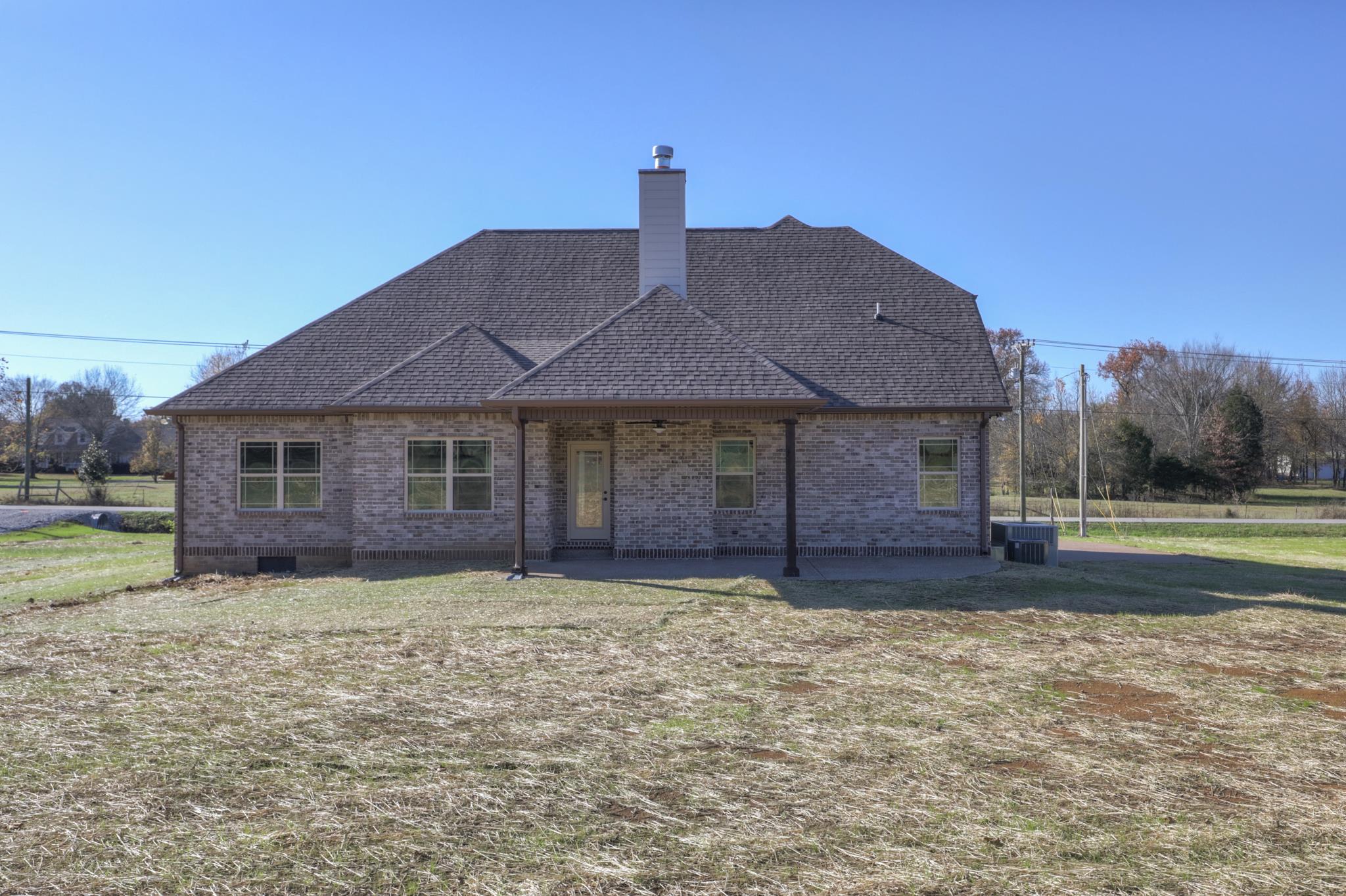 2211 Cairo Bend Road Lebanon, TN 37087 - Photo 29 of 29 a front view of a house with a yard