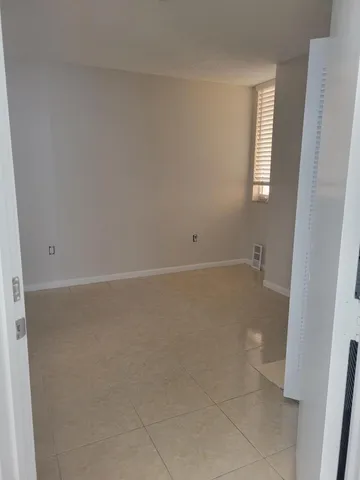 an empty room with a workbench