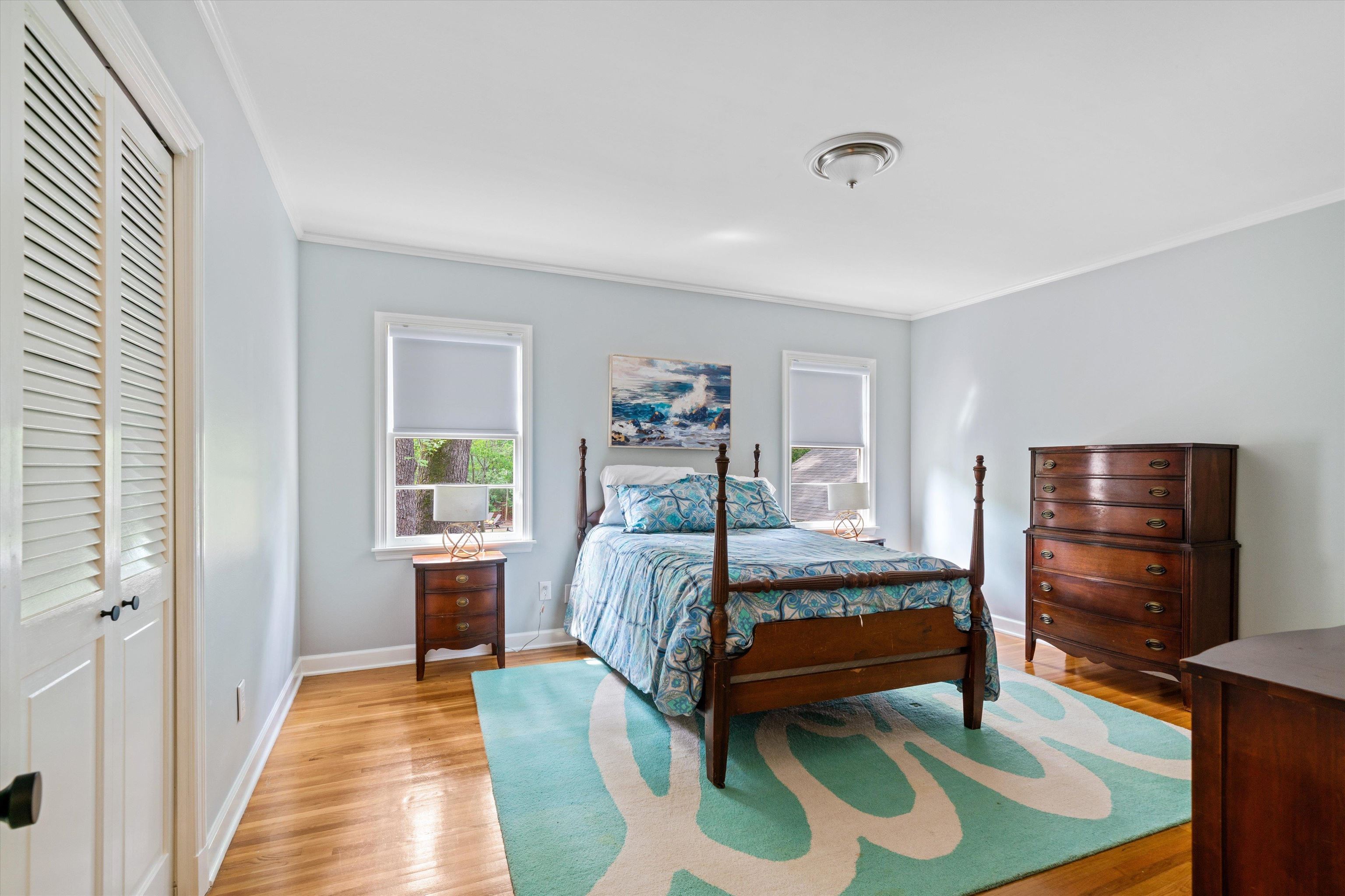 4391 Barfield Road Memphis, TN 38117 - Photo 21 of 25 a bedroom with a bed and wooden floor