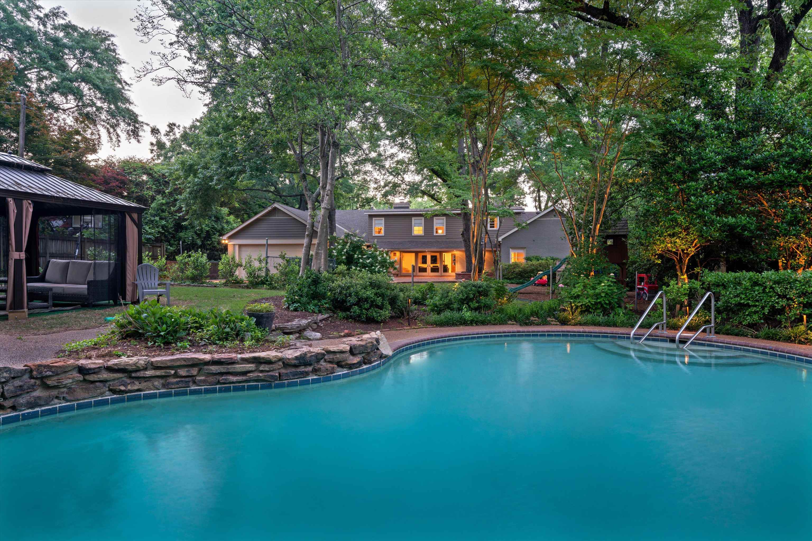 4391 Barfield Road Memphis, TN 38117 - Photo 24 of 25 a front view of a house with garden