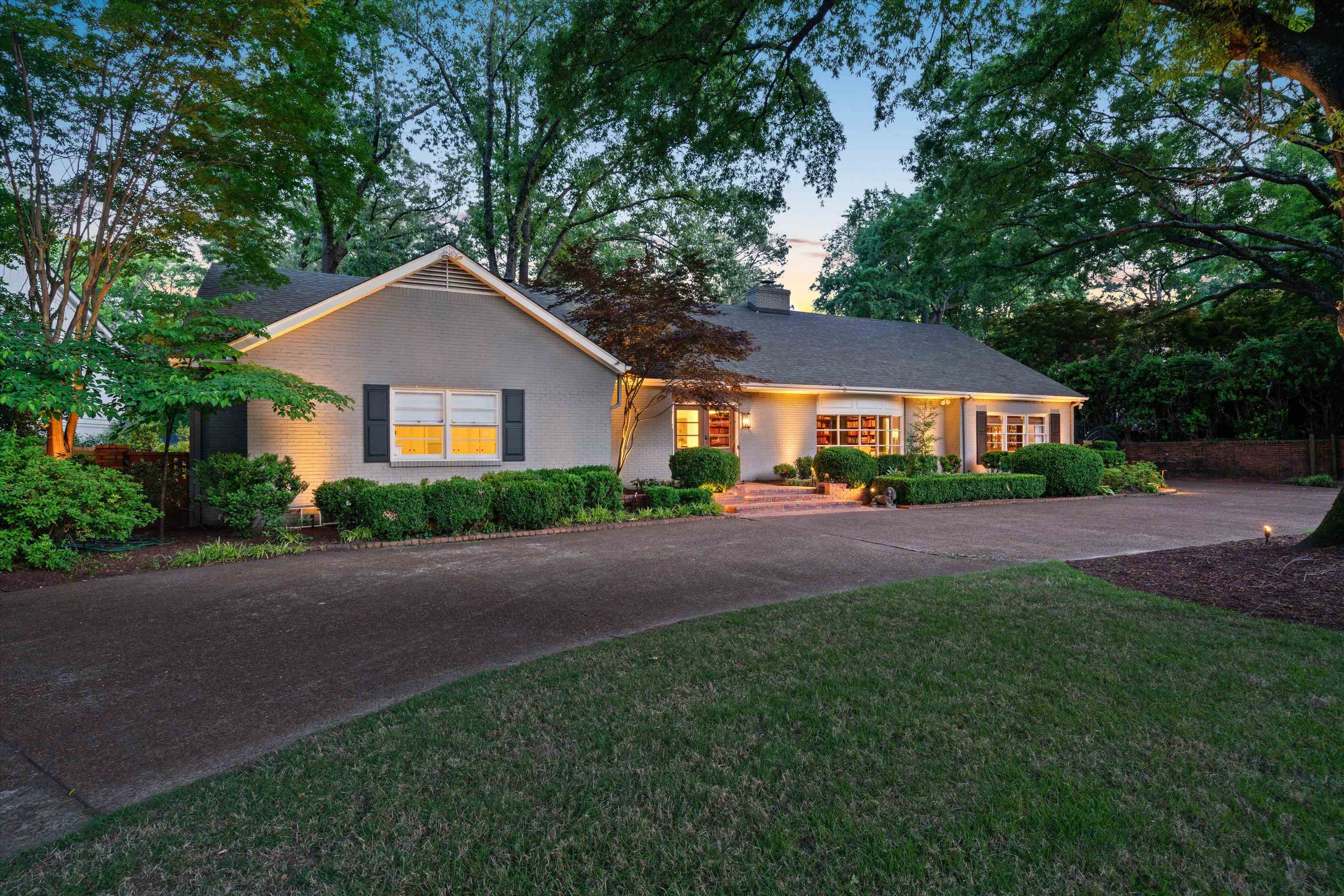 4391 Barfield Road Memphis, TN 38117 - Photo 25 of 25 a front view of a house with a yard and green space