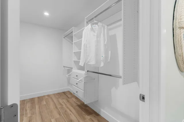 a bedroom with a bed and a view of bedroom