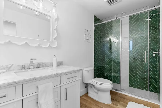 a swimming pool with outdoor seating and yard