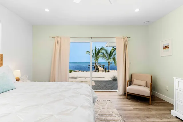 a view of a swimming pool and an outdoor space