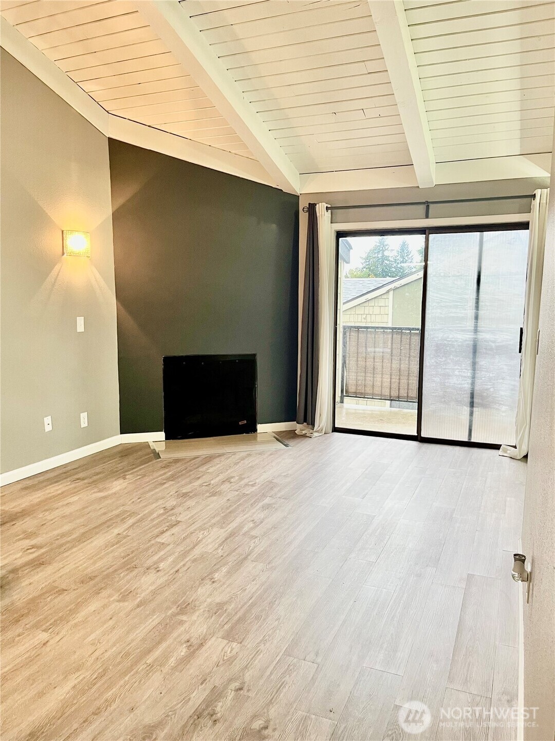 2020 Grant Avenue South, Unit A302 Renton, WA 98055 - Photo 3 of 22 a view of an empty room with a window