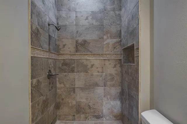 a view of a room with racks on the wall