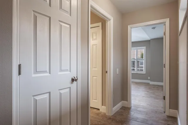 a view of an empty room with a window